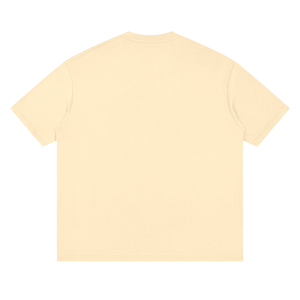 Plain light yellow t-shirt on a white background