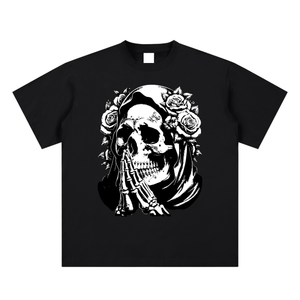 Black t-shirt with a white skull and roses design on a white background