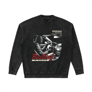Black sweatshirt with graphic design and text on a white background