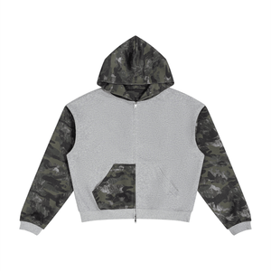 A zip-up hoodie with a light gray body and camouflage-patterned sleeves and hood, featuring a front pocket and embroidered chest logos, shown on a plain white background.