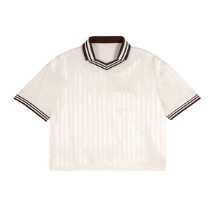 Beige ribbed knit t-shirt with brown trim on a white background