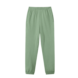 Green sweatpants on a white background