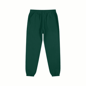 Green sweatpants on a white background