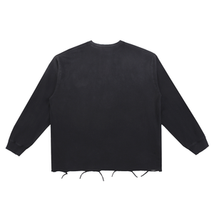 Black sweater with fringe details on a white background