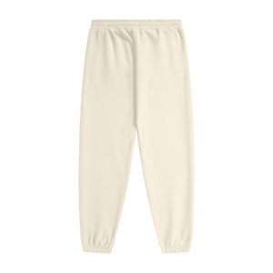 Cream-colored fleece sweatpants with an elastic waistband and ribbed ankle cuffs, shown flat against a solid white background.