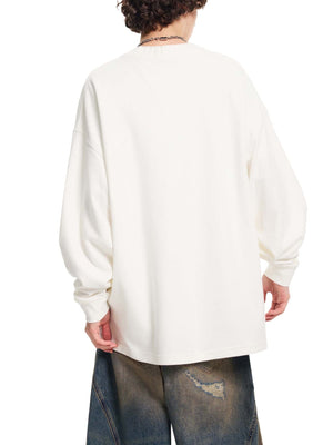 Person wearing a white long-sleeve shirt and blue jeans on a white background