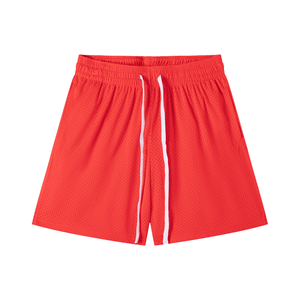 Red shorts with a white stripe on a white background