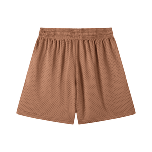 Brown shorts with a textured pattern on a white background