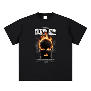 Black t-shirt with a graphic design featuring a flaming mask and text on a white background