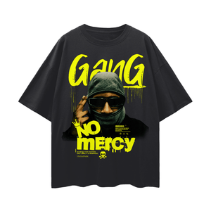 Black t-shirt with yellow text 'Gang No Mercy' featuring a graphic of a person wearing sunglasses and a hood on a white background.