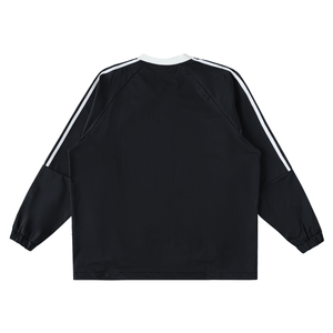 Black long-sleeve shirt with white stripes on sleeves against a white background