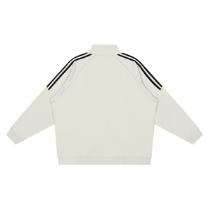 White sweatshirt with black stripes on a white background