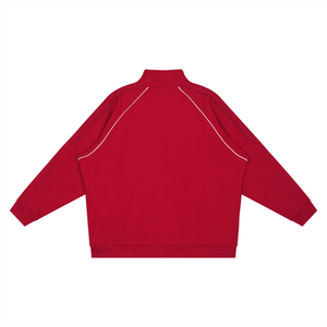 Red jacket with white piping on a white background