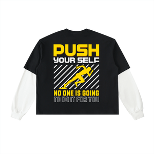 Black t-shirt with motivational text and graphic on the back, white sleeves.