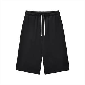 Black shorts with a drawstring on a white background