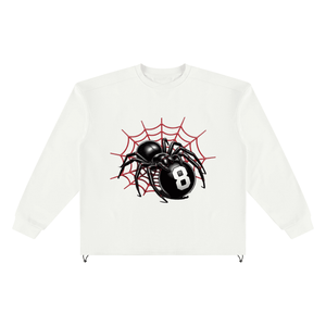 An off-white long-sleeve crewneck sweatshirt featuring a graphic of a black spider and a black 8-ball under a red spiderweb on the chest.