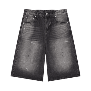 Black distressed denim shorts on a white background