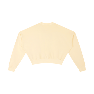 Light yellow crop top on a white background