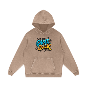 Beige hoodie with 'Game Over' text design on a white background