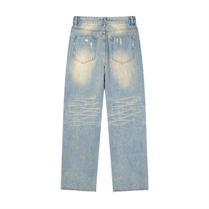 Light blue distressed jeans on a white background