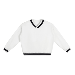 White sweater with black trim on a white background