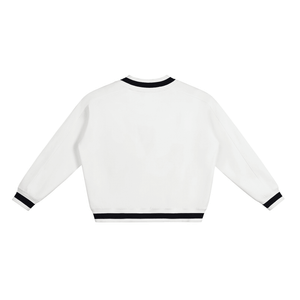 White sweater with black trim on a white background