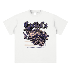 White t-shirt with a graphic design featuring a skeleton hand holding a card and text on a white background