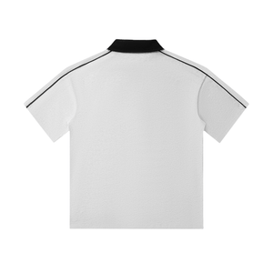 White polo shirt with black trim on a white background