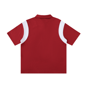 Red polo shirt with white trim on a white background