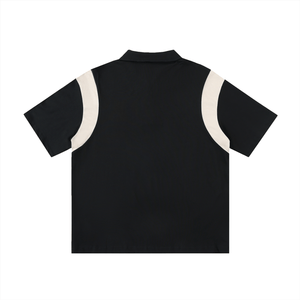Black t-shirt with white trim on a white background