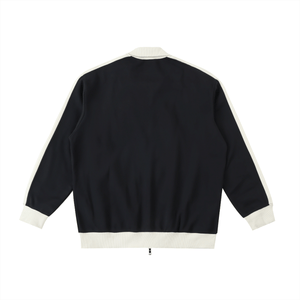 Black jacket with white trim on a white background