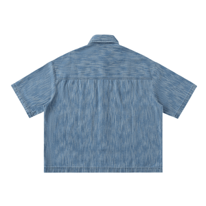 Blue denim shirt on a white background