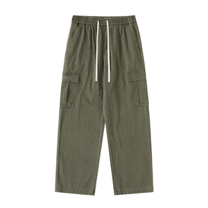 Green cargo pants with drawstring on a white background