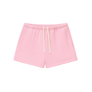 Pink shorts with a drawstring on a white background