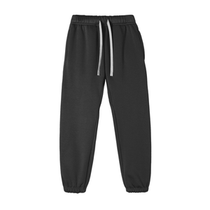 Black jogger pants with a white drawstring on a white background