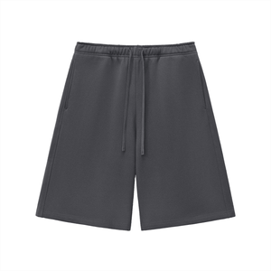 Dark gray shorts with a drawstring on a white background