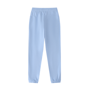 Light blue sweatpants on a white background