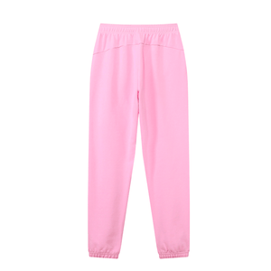 Pink sweatpants on a white background