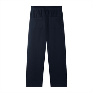 Navy blue pants with two front pockets on a white background