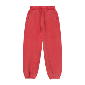 Red sweatpants on a white background