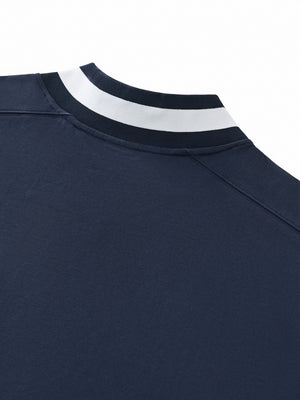 Navy blue polo shirt with white collar stripes on a white background
