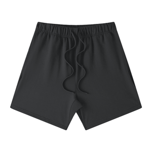 Black shorts with a small logo on a white background
