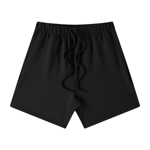 Black shorts with a small logo on a white background