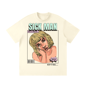 An off-white short-sleeve t-shirt with a graphic print on the front. The graphic features the text 'SICK MAN' in a light green and black striped font above an illustration of a woman with blonde hair, with additional text reading 'LOVE IS BROOKLYN' and 'KEEP IT REAL.
