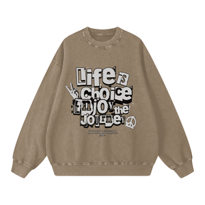 Beige sweatshirt with motivational text design on a white background