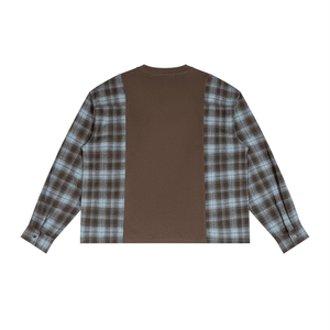 A long-sleeve shirt shown from the back, featuring a solid brown center panel and brown, gray, and light blue plaid fabric on the sleeves, set against a plain white background.