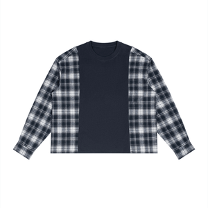 A long-sleeve crewneck shirt with a solid navy blue center panel and black-and-white plaid sleeves, featuring a small white 'emilygrant' logo on the chest, displayed flat against a white background.