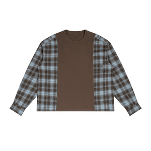 A long-sleeve crewneck shirt with a solid brown center panel and brown-and-blue plaid fabric on the sleeves, shown flat against a white background.