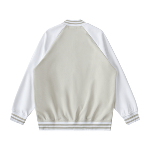 White and beige varsity jacket on a white background