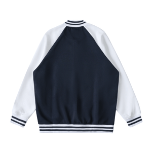 Navy and white baseball jacket on a white background